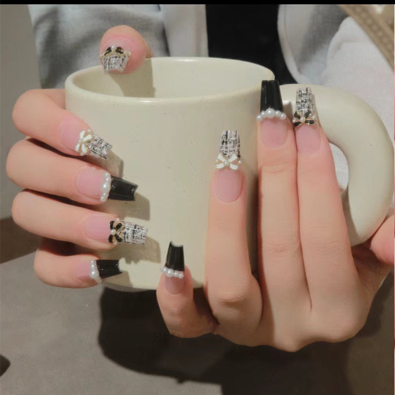 Glamorous nail designs with pearl and rhinestone accents Bowlift