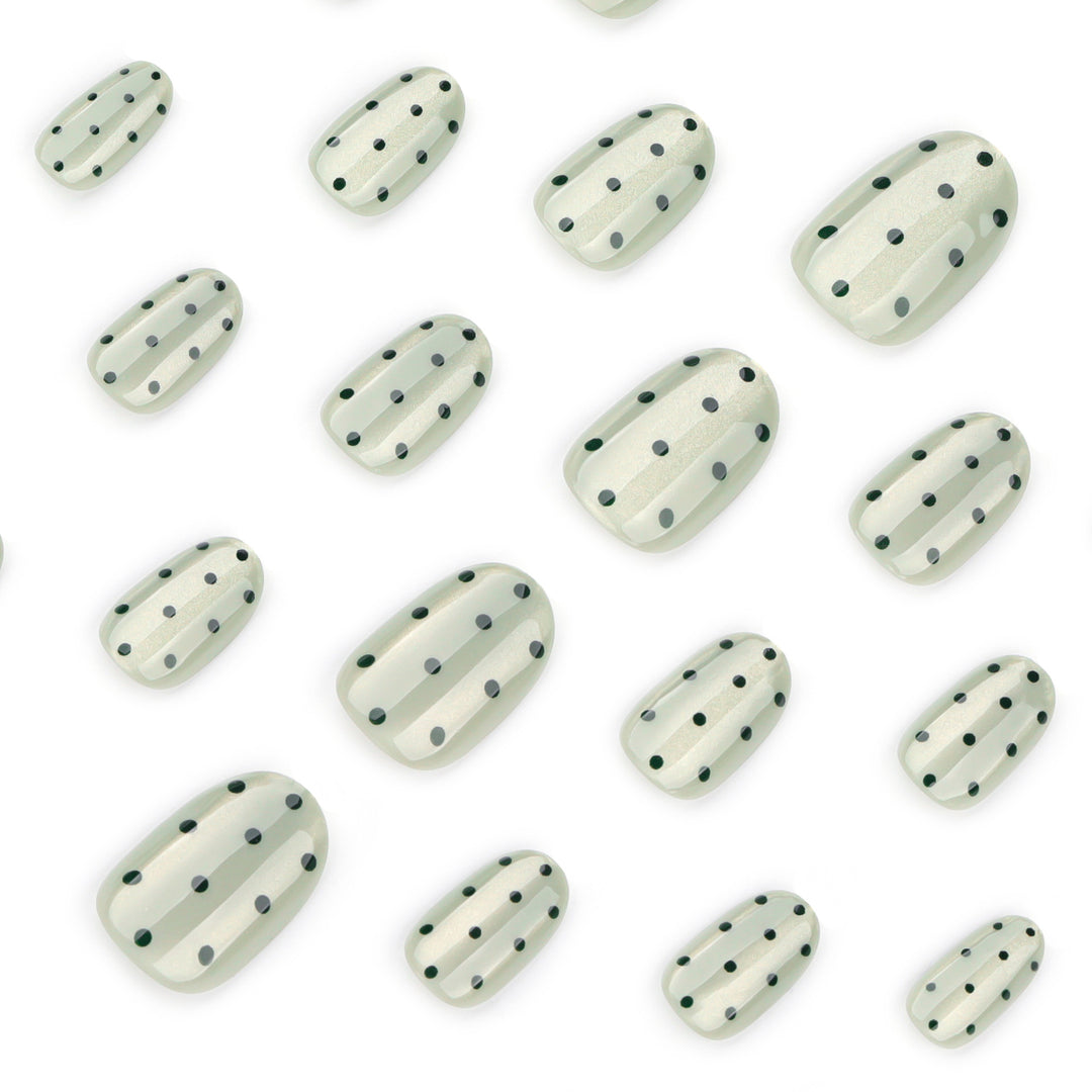 Creative Nail Art with Polka Dot Pattern Bowlift