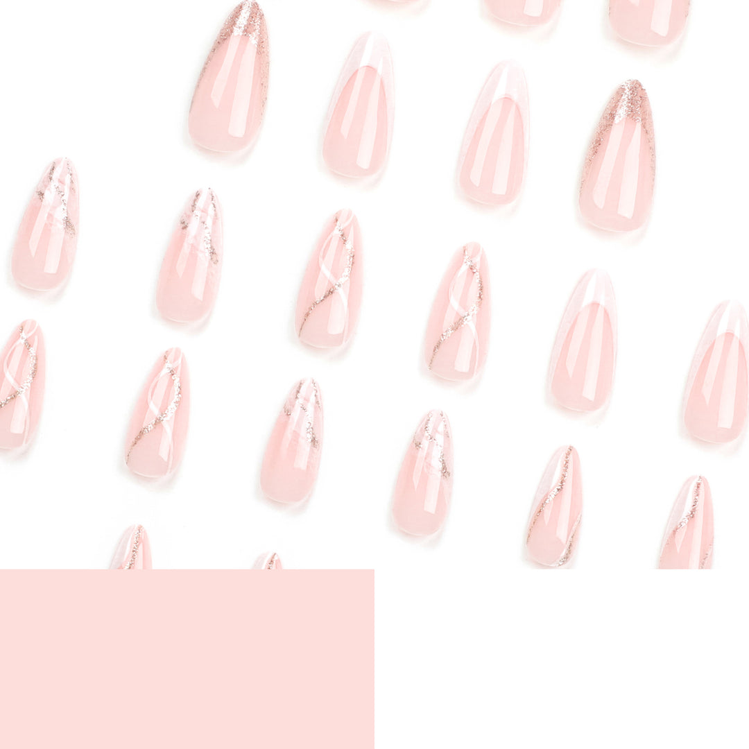 Artful stiletto nails with elegant marble and glitter design Bowlift