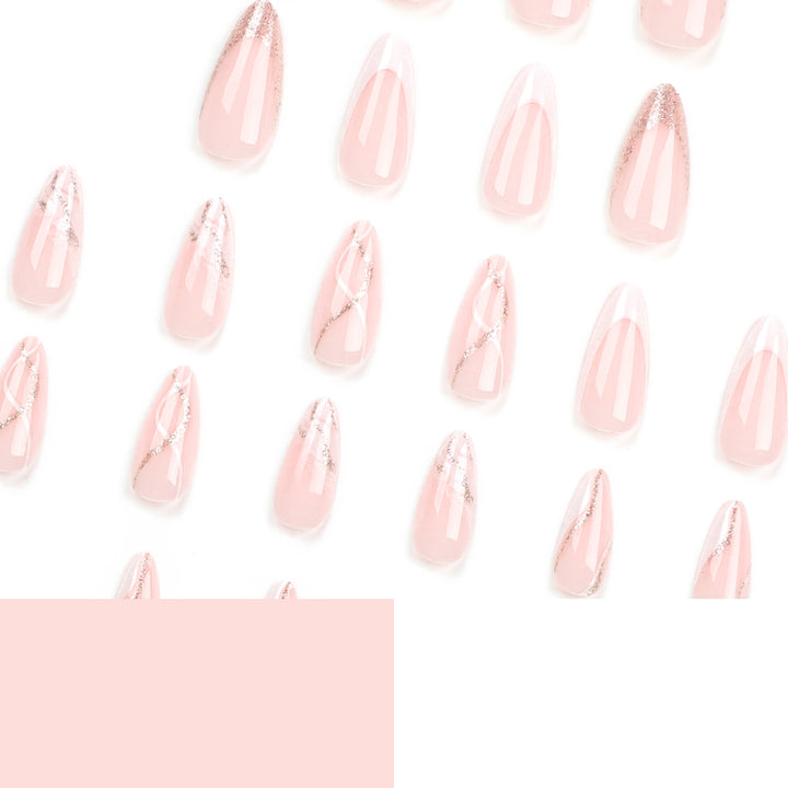 Artful stiletto nails with elegant marble and glitter design Bowlift