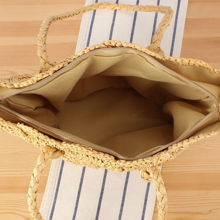 Hand-knotted beach bag with decorative motif Bowlift