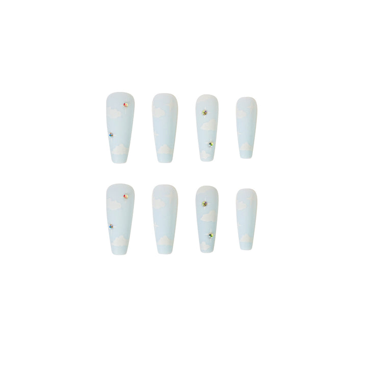 Creative nail art in cloud design with glitter accents Bowlift