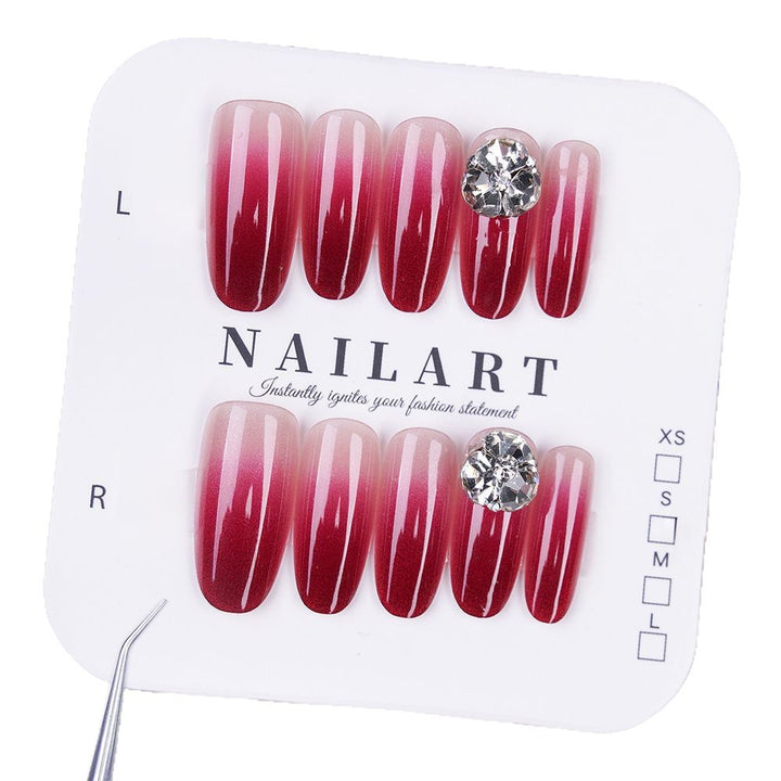 Artificial nails with elegant ombre effect and rhinestone decoration Bowlift