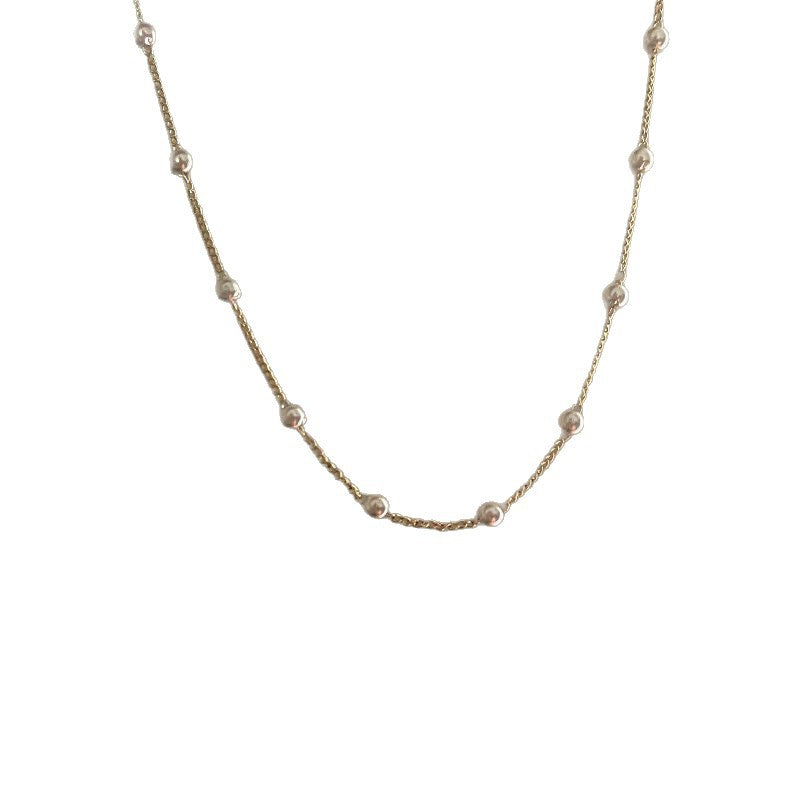Delicate Pearl Accented Chain Necklace Bowlift
