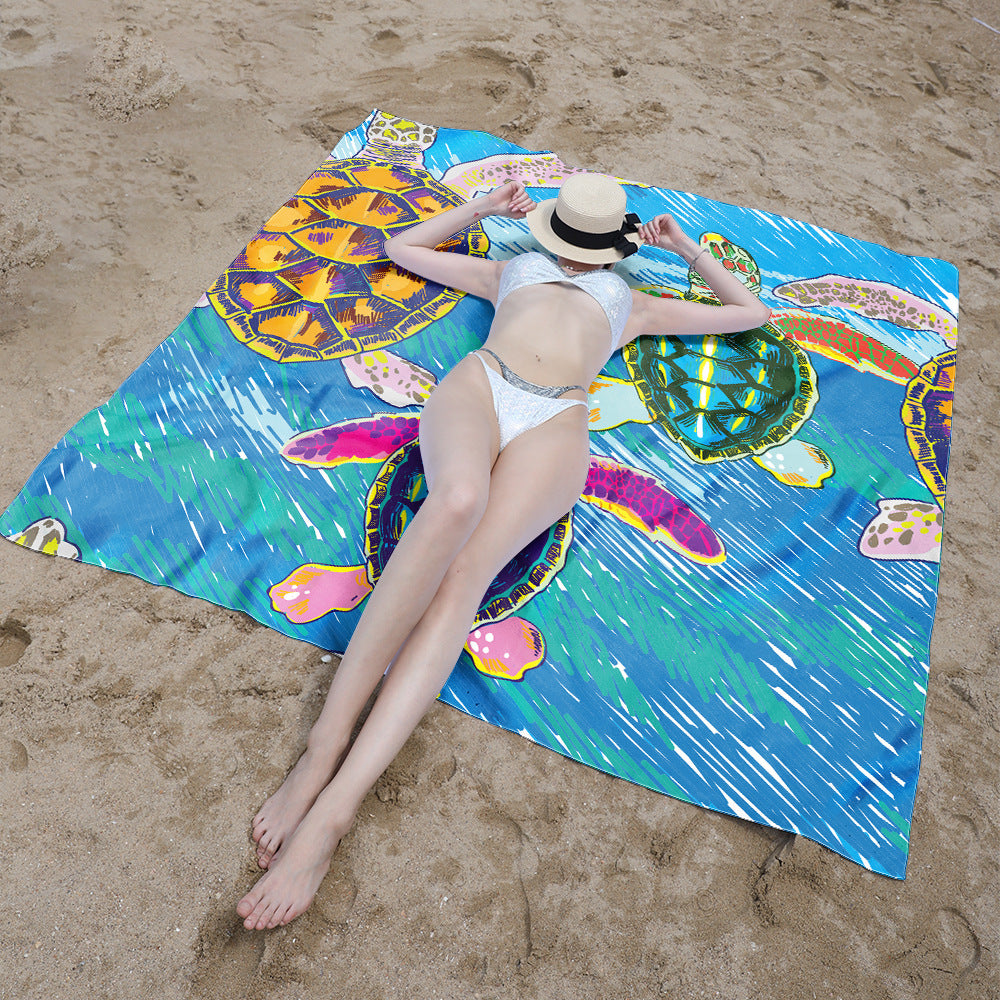 Beach blanket with colorful turtle pattern Bowlift