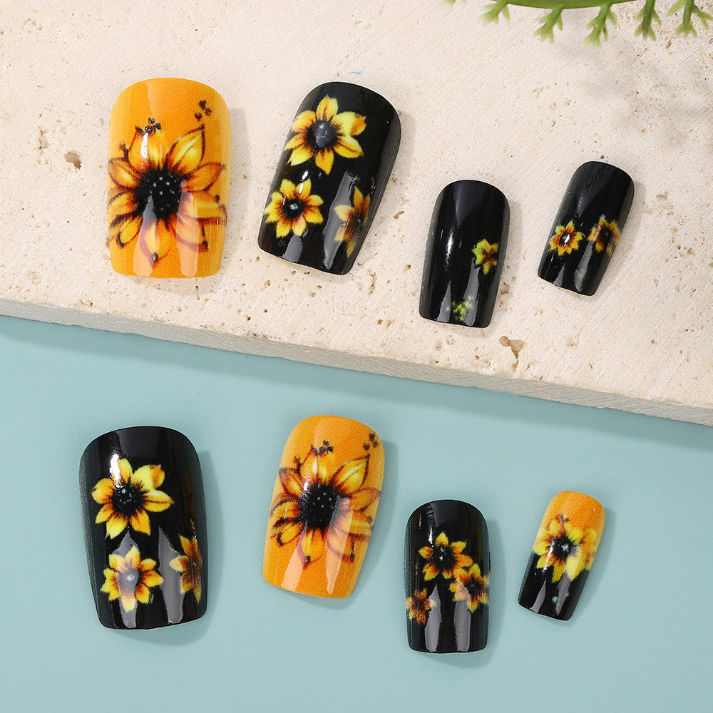 Artificial nails in floral design with sunflower motif Bowlift