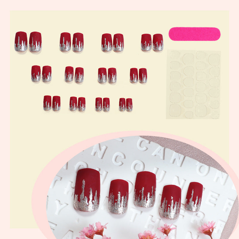 Artistic Press-On Nail Set with Silver Drip Design Bowlift