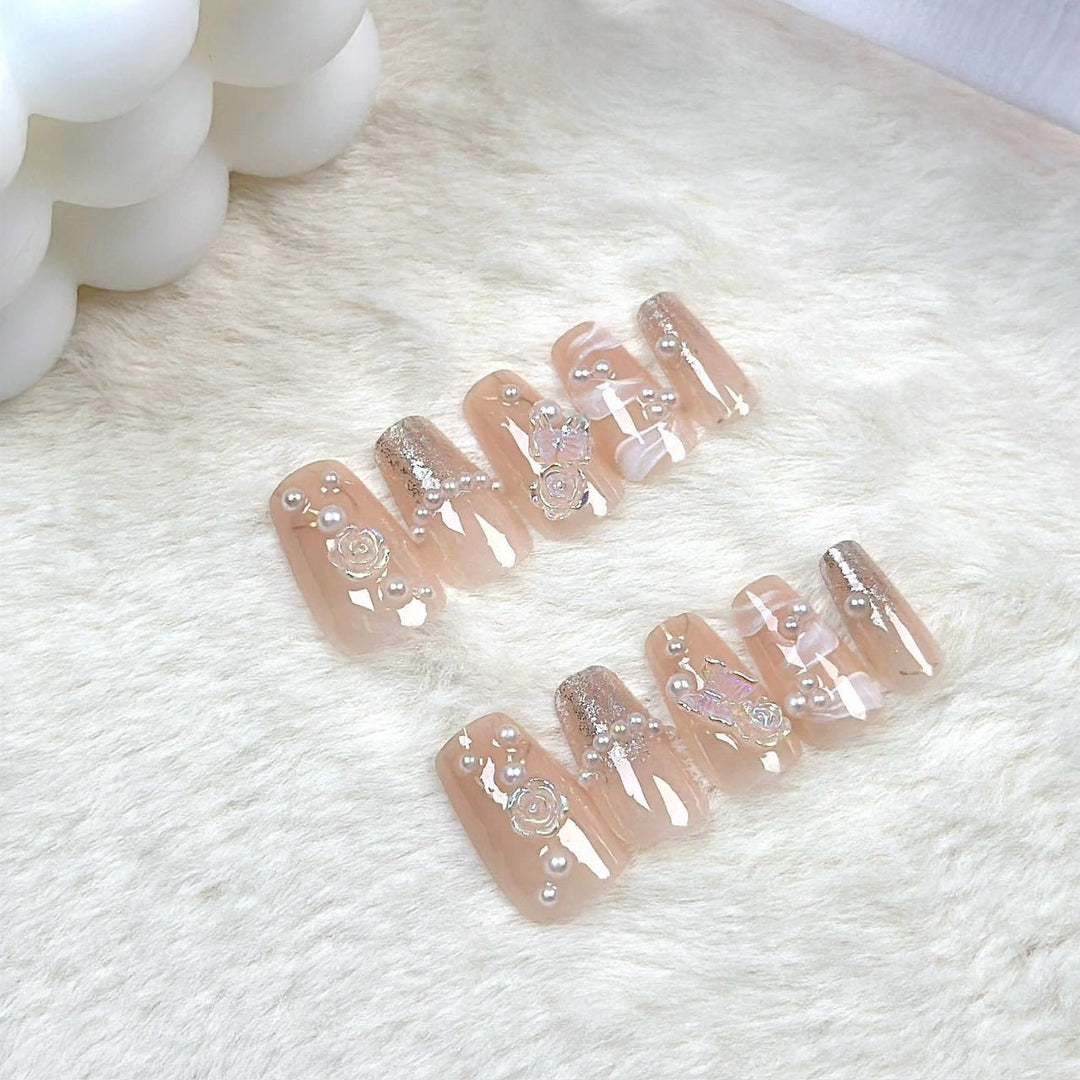 Artistic nail set with 3D flower and bow details Bowlift