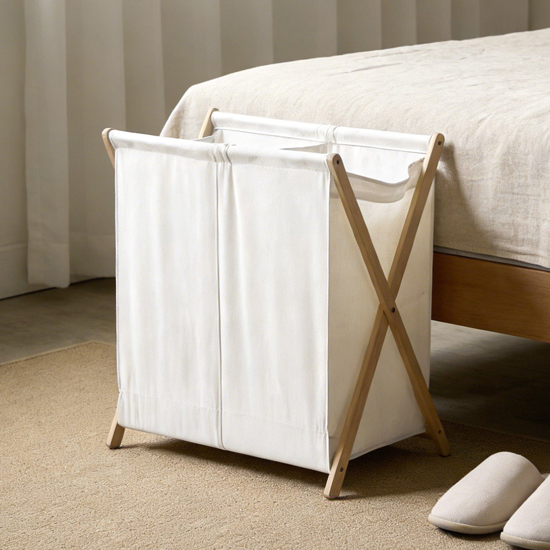 Modern laundry basket with folding frame Bowlift