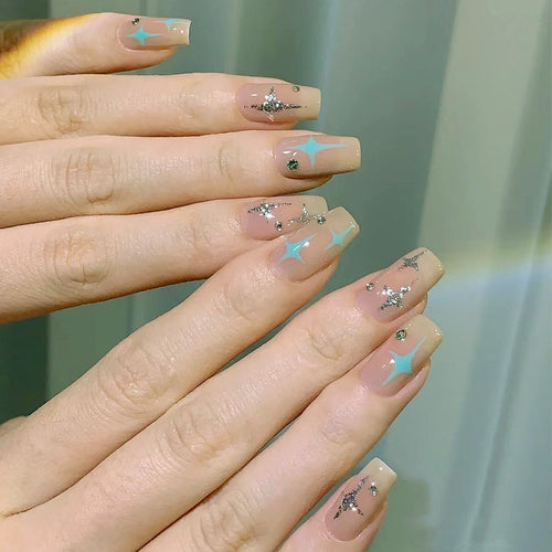 Acrylic nail set with sparkling star and glitter elements Bowlift