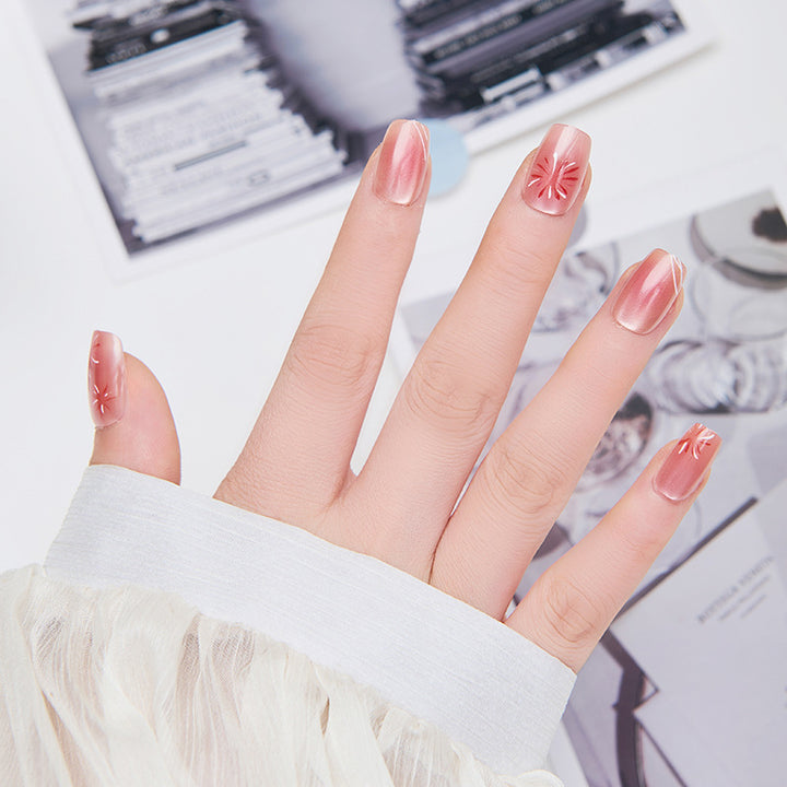 Artistic nail extensions with floral accents Bowlift