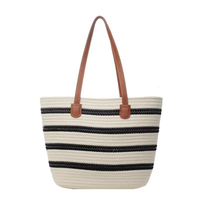 Fashion shopping bag with textured wicker design and leather handles Bowlift