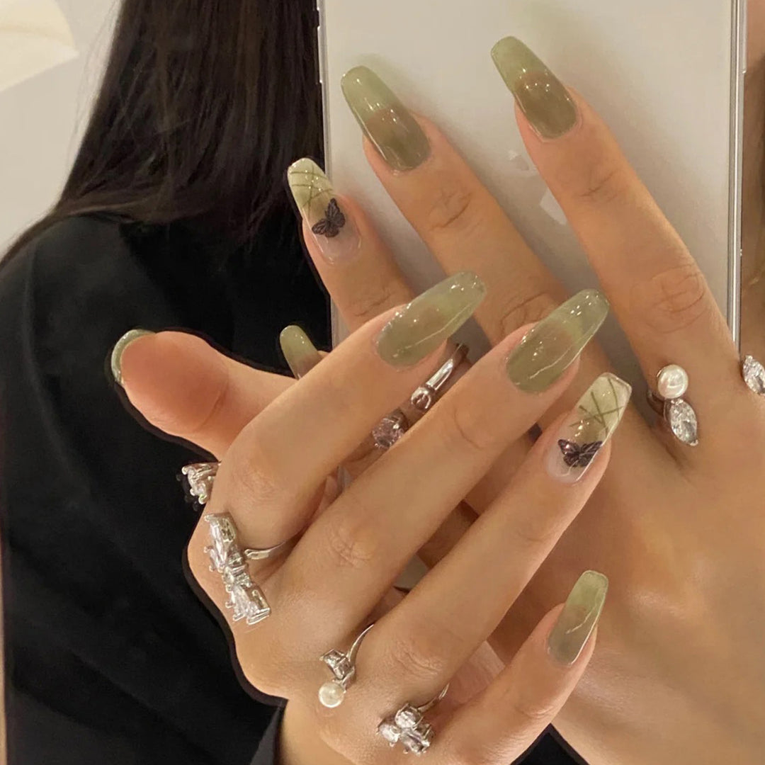 Artificial nail extensions with elegant butterfly design Bowlift