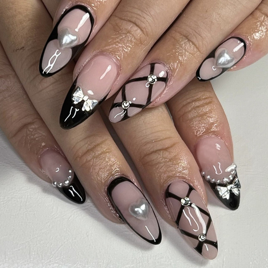 Nail art set with elegant, asymmetric design Bowlift