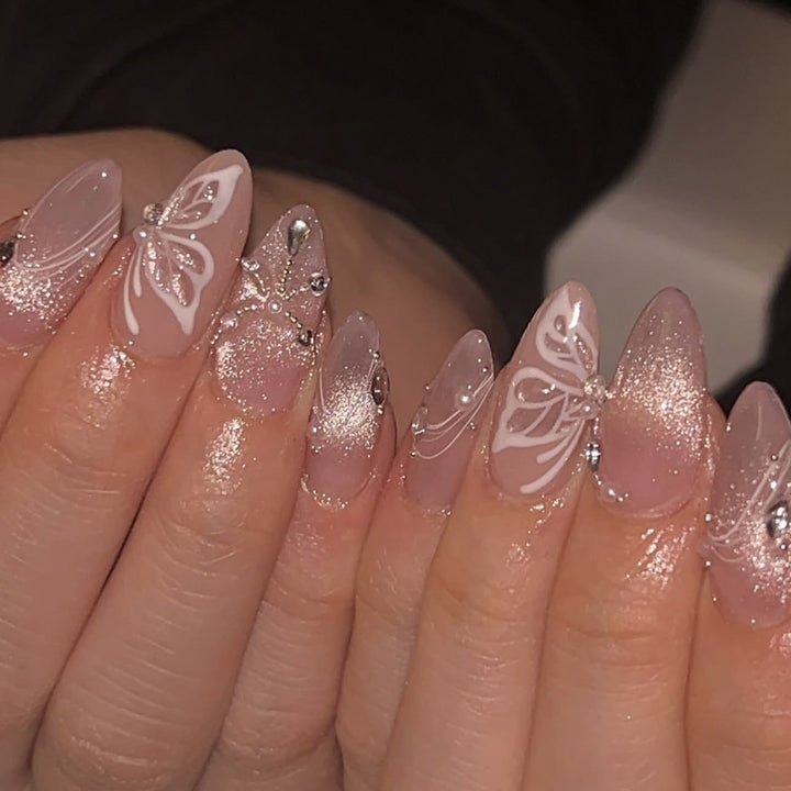 Artful nail extensions with delicate flower and glitter accents Bowlift