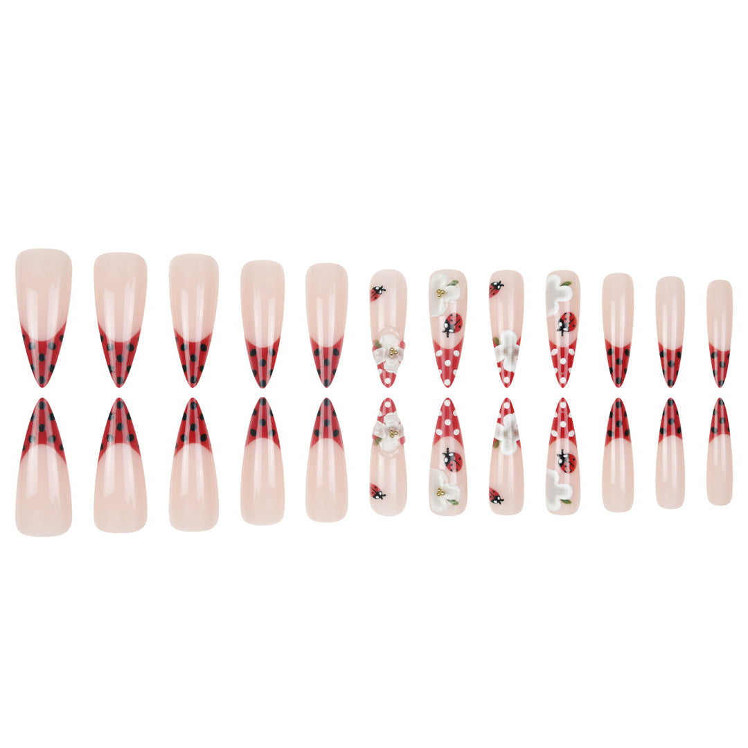 Artistic Press-On Nails with Floral and Polka Dot Design Bowlift