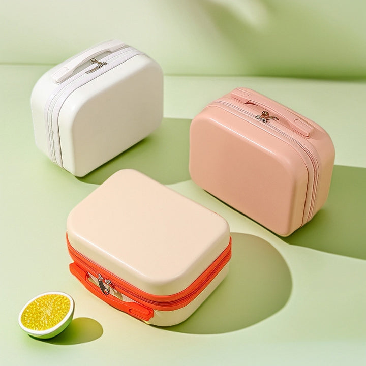 hard-shell travel vanity case with molded handle and double-zip closure Bowlift