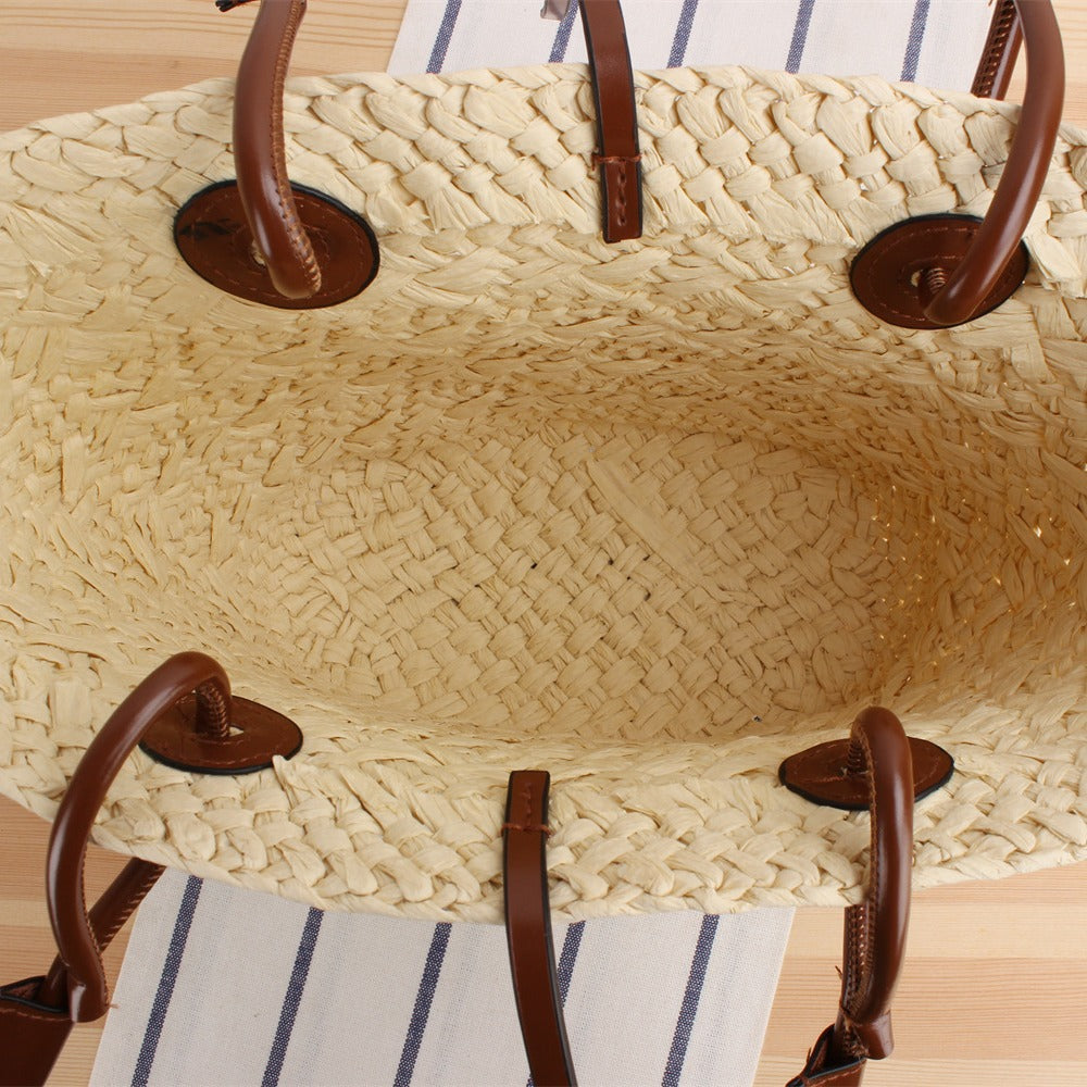 Beach bag made of high-quality braided straw with stylish leather handles Bowlift