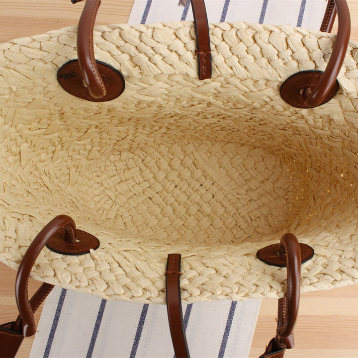 Beach bag made of high-quality braided straw with stylish leather handles Bowlift
