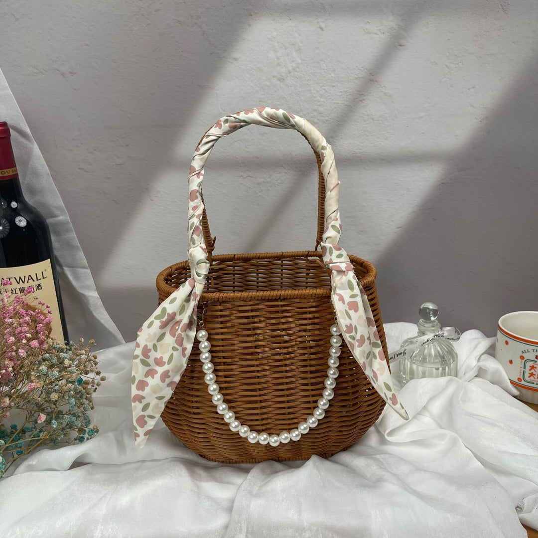 Women's stylish rattan container with pearl handle Bowlift