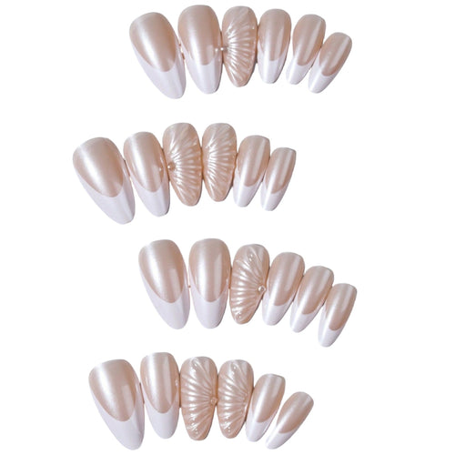 Artificial nail set with elegant shell pattern and glitter accents Bowlift