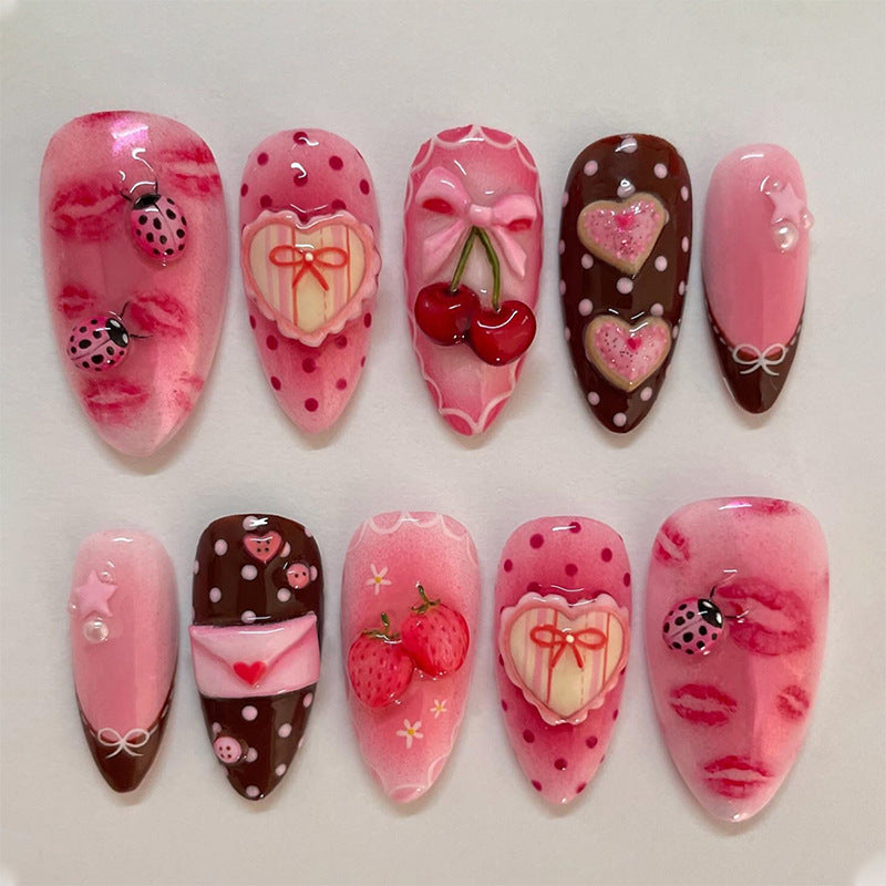 Artificial nail set with floral and playful tea motifs Bowlift