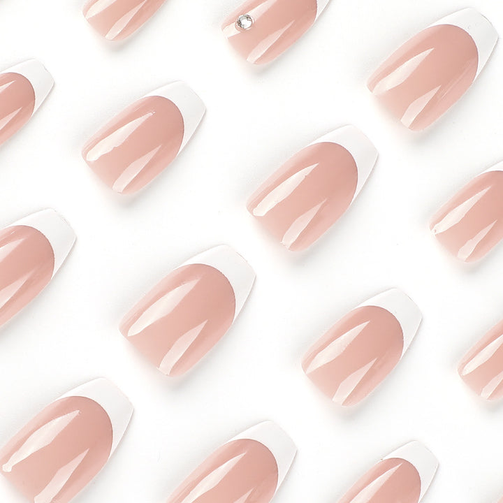 Glamorous artificial nails with French manicure Bowlift