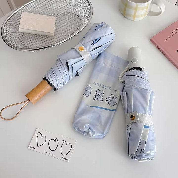 Women's Foldable Umbrella with Playful Checkered Pattern Bowlift