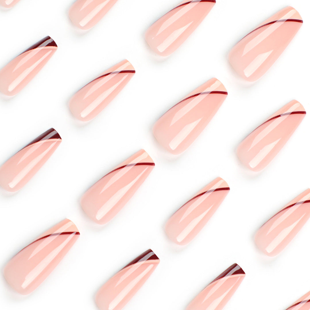 Artful stiletto nails with elegant gradient and geometric accents Bowlift