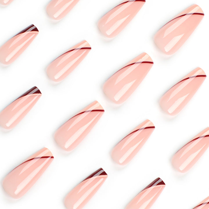 Artful stiletto nails with elegant gradient and geometric accents Bowlift