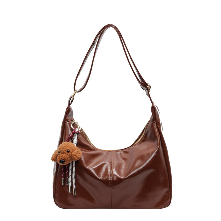 Shoulder bag with charming animal pendant Bowlift