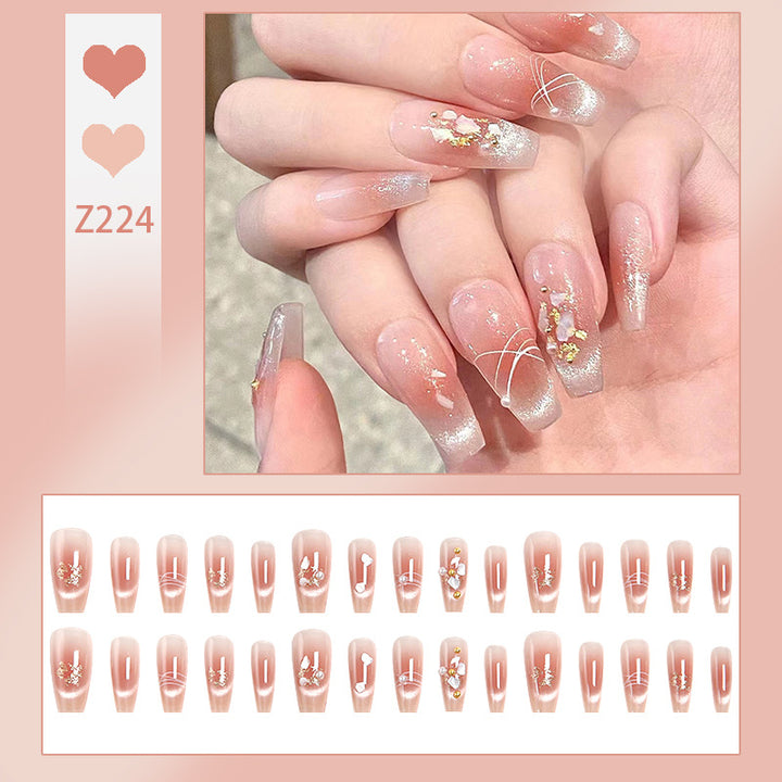 Artificial nail set with elegant glitter and flower decorations Bowlift