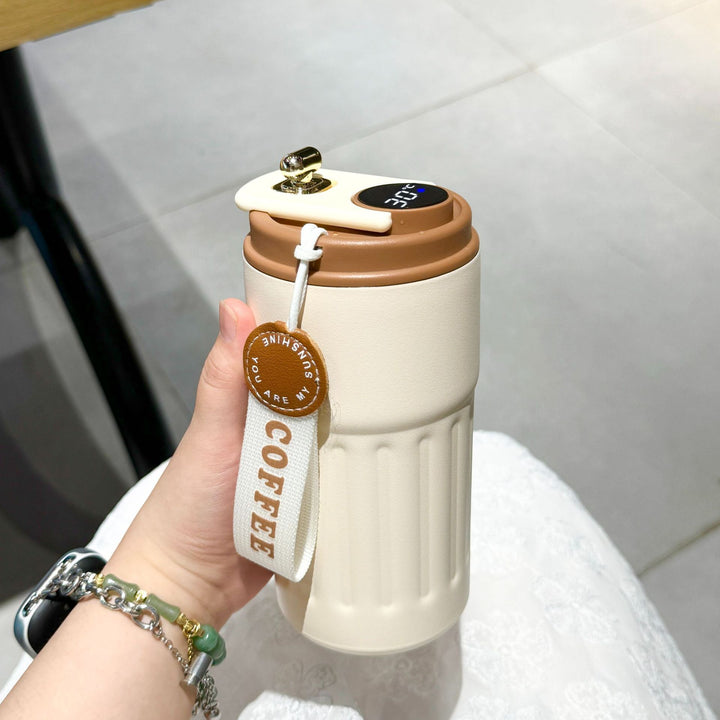 Ladies insulated cup with practical carrying strap Bowlift