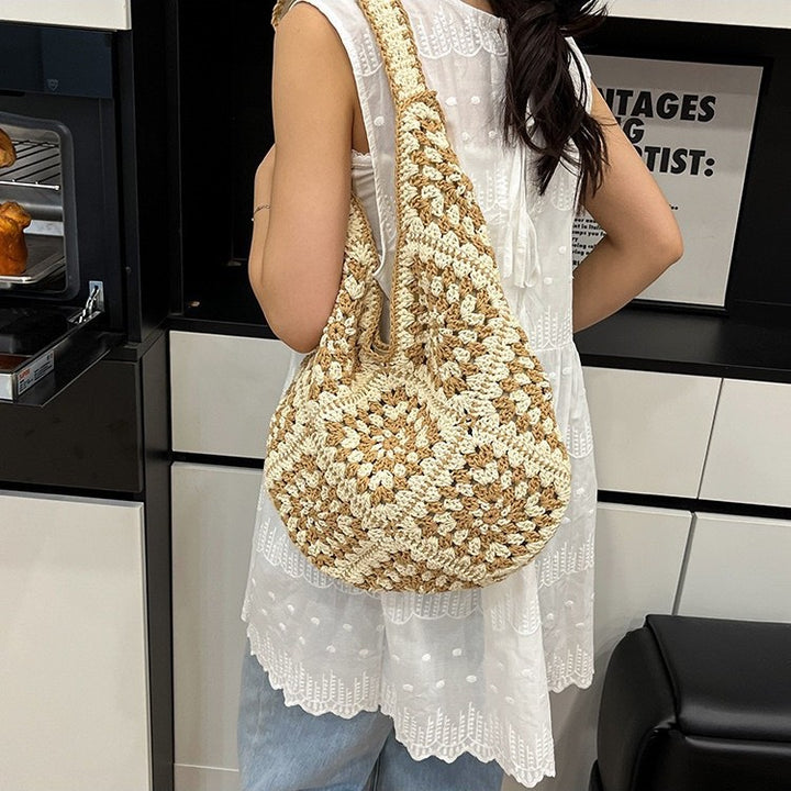 Hand-knotted shoulder bag with floral motifs Bowlift