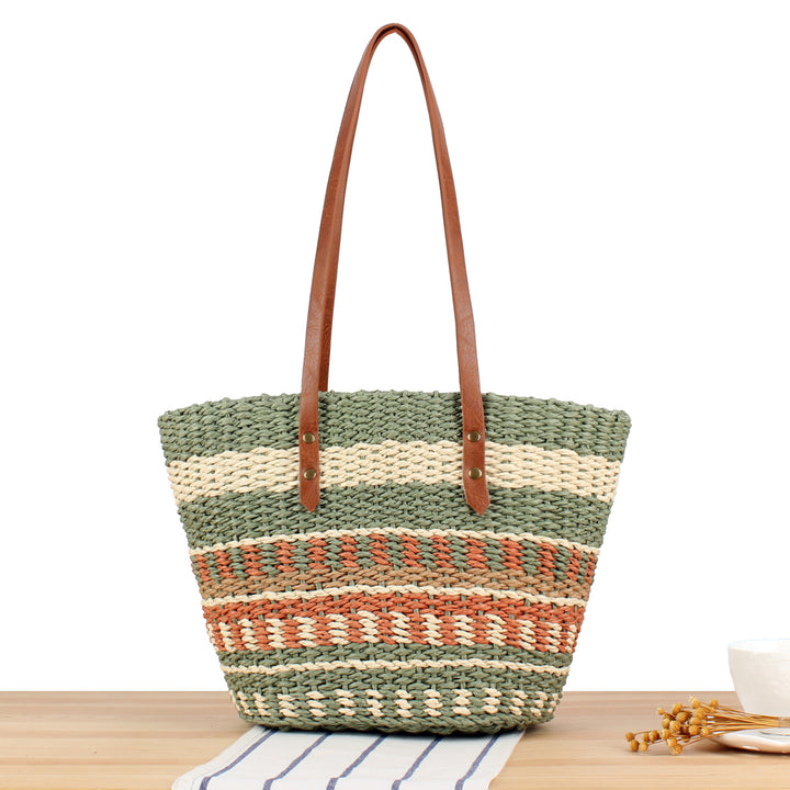 Tote bag made of braided natural material with elegant leather handles Bowlift