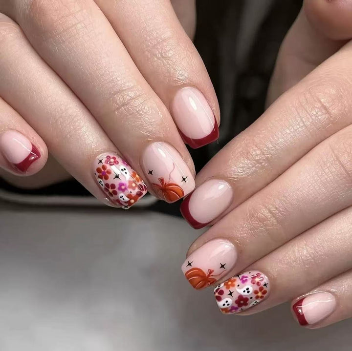 Artificial nail set with cheerful flower designs and elegant French tips Bowlift