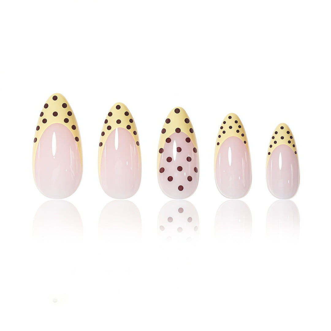Elegant French Tip Nail Enhancements with Polka Dot Design Bowlift