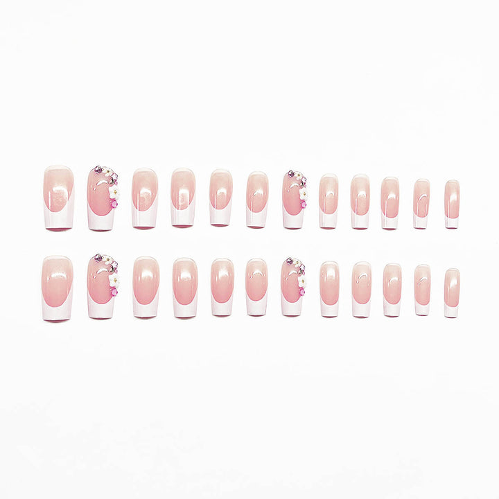 Artificial nail set with elegant floral decorations and transparent finish Bowlift