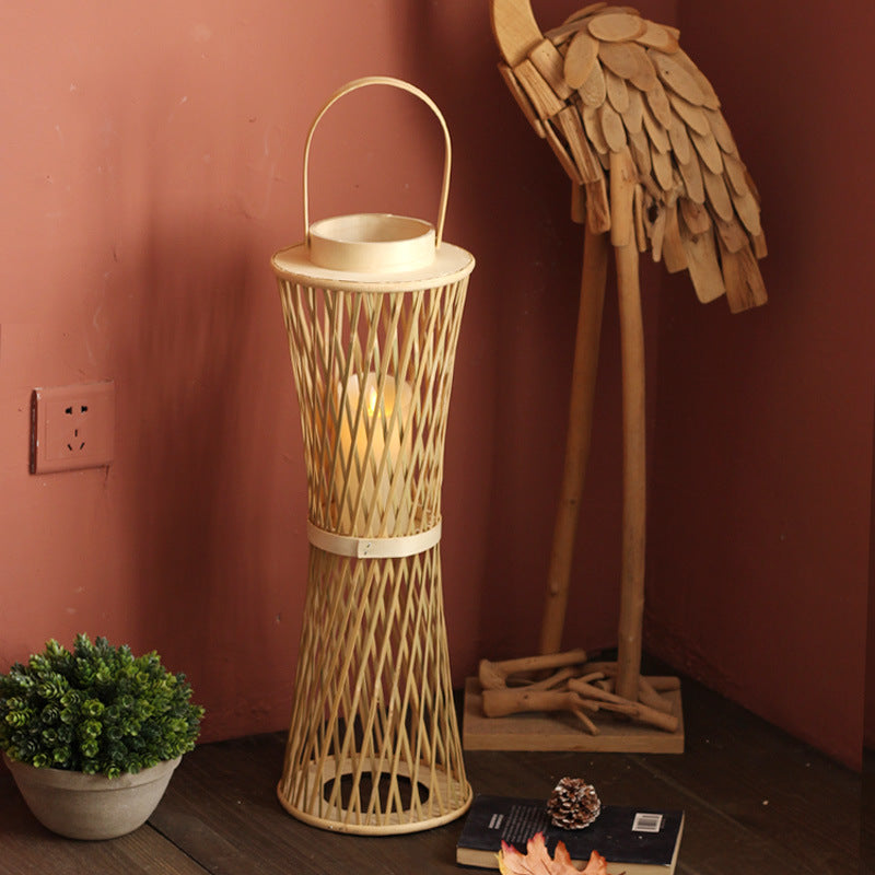 Elegant lamp stand made of woven material Bowlift