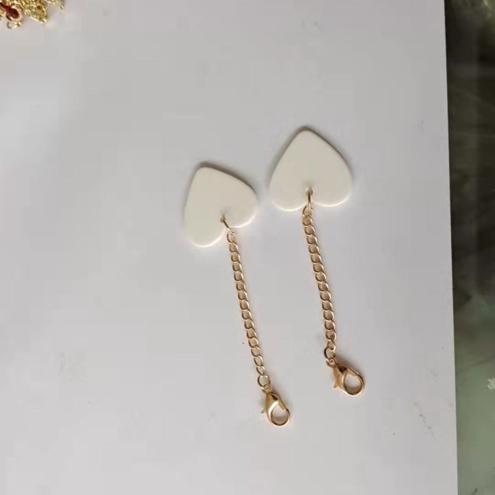 Heart-Shaped Dangle Earrings with Golden Chain Bowlift