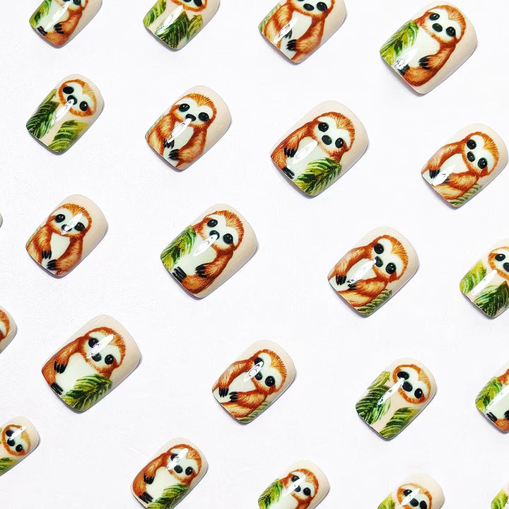 Art nails with cute sloth and leaf design Bowlift