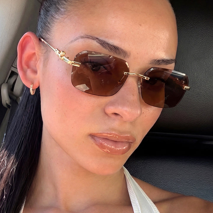 Women's fashionable square sunglasses with elegant gold frame and protective UV filter Bowlift