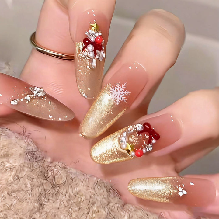 Artificial nail set with festive gift design and elegant glitter accents Bowlift