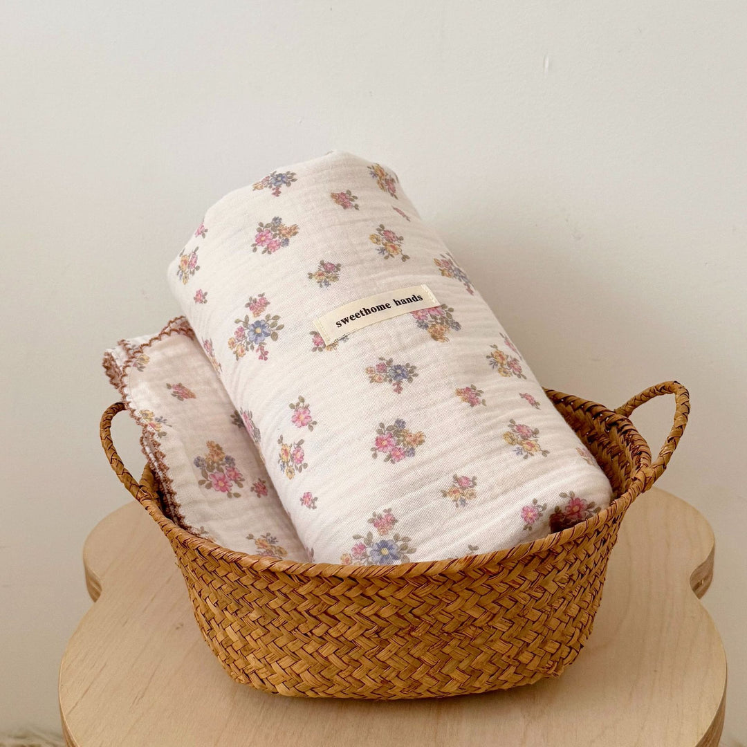 Unisex Muslin Blanket with delicate floral design and elegant ruffles Bowlift