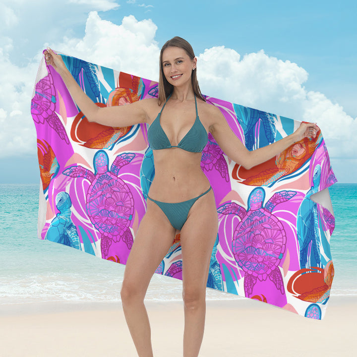 Beach towel with vibrant tropical plant motif Bowlift