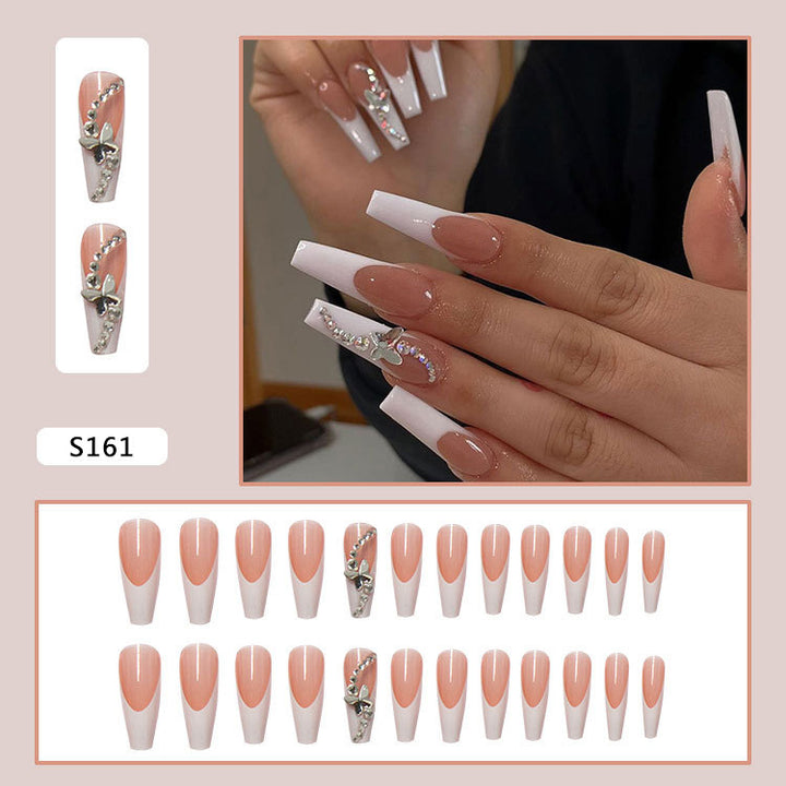 Acrylic nail set with glamorous tips embellishments and elegant accents Bowlift