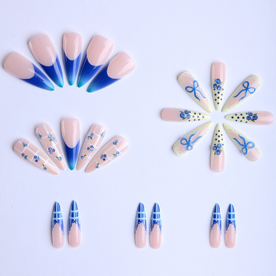 Artificial nails with playful design and elegant accents Bowlift