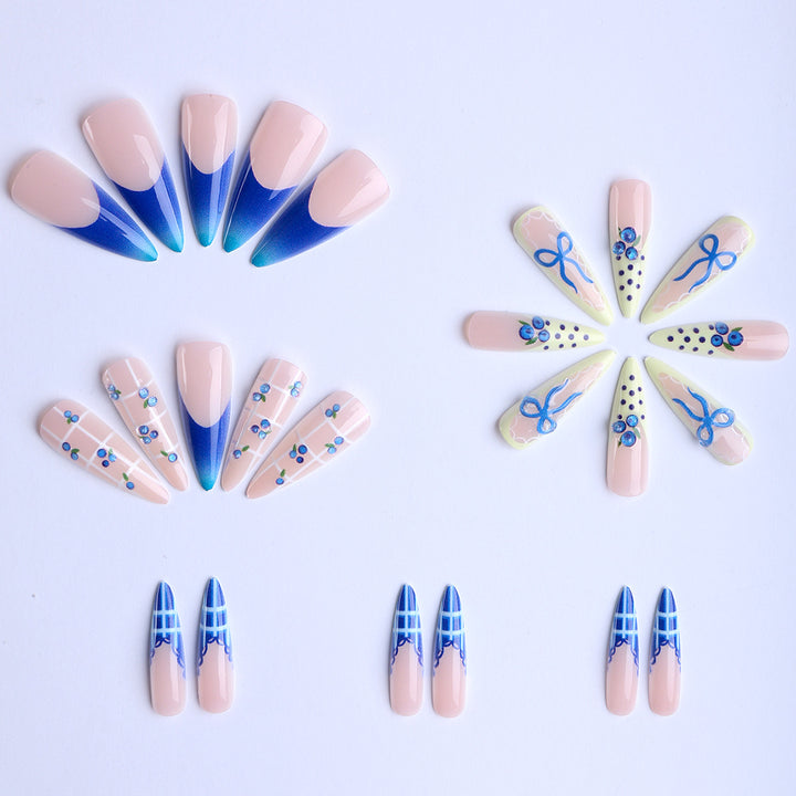 Artificial nails with playful design and elegant accents Bowlift