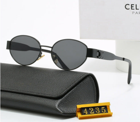 Women elegant oval sunglasses with gold-colored frame Bowlift