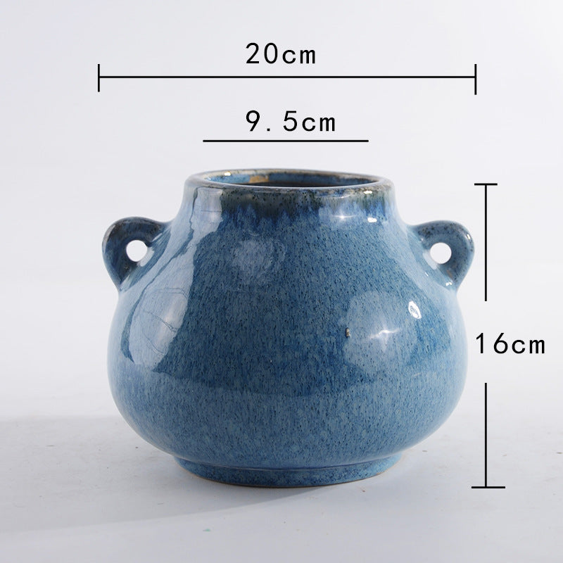Decorative ceramic pot with playful handles Bowlift